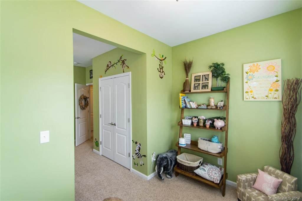 938 Treasure Court Fort Mill, SC 29708 - Photo 19 of 24 a room with toys and a window