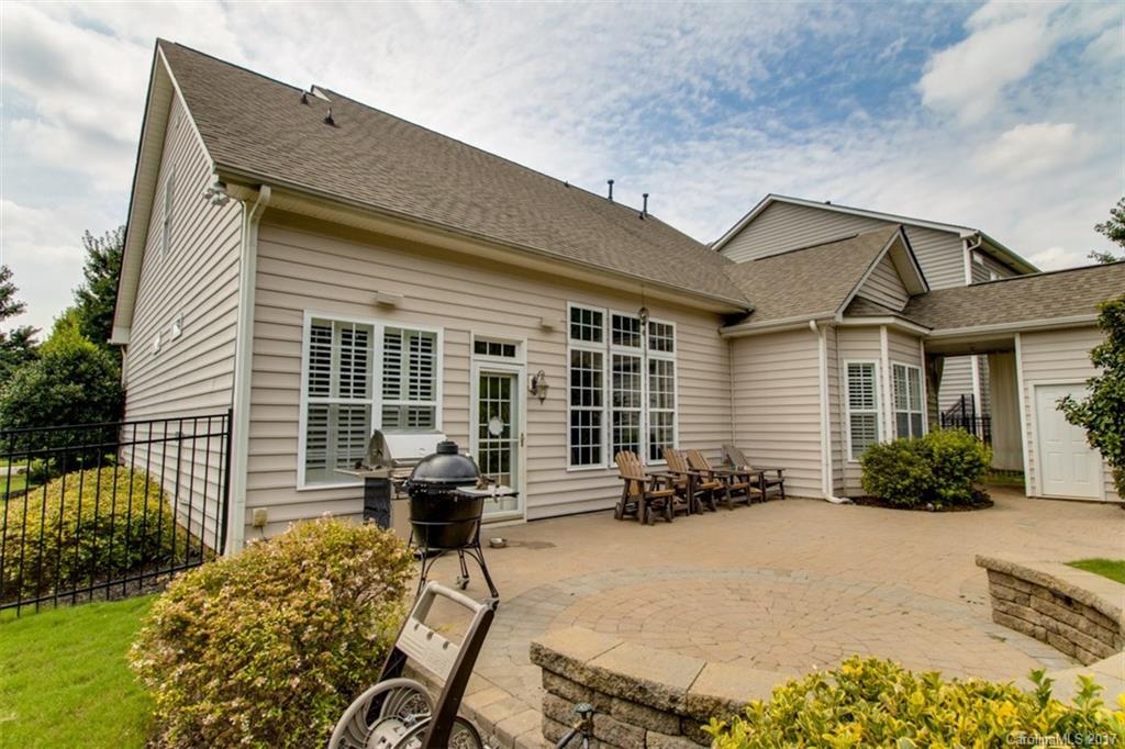 938 Treasure Court Fort Mill, SC 29708 - Photo 22 of 24 a front view of a house with patio