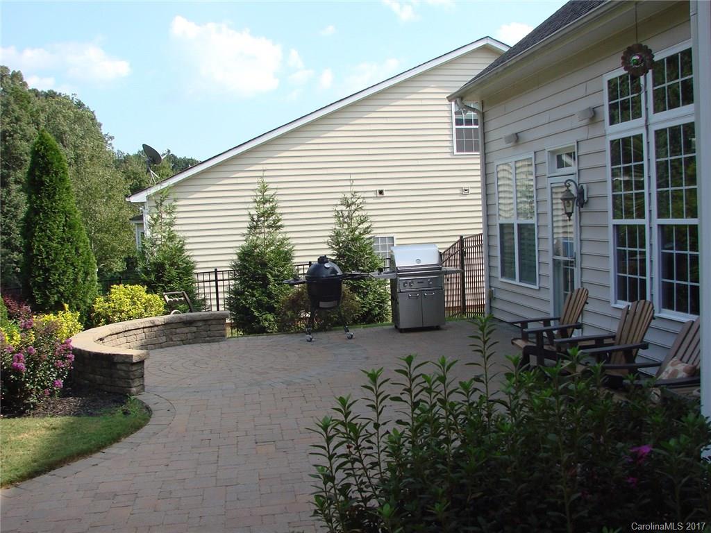 938 Treasure Court Fort Mill, SC 29708 - Photo 23 of 24 a view of a house with backyard and sitting area