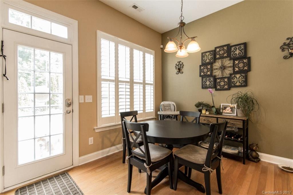 938 Treasure Court Fort Mill, SC 29708 - Photo 8 of 24 a view of a dining room with furniture and window