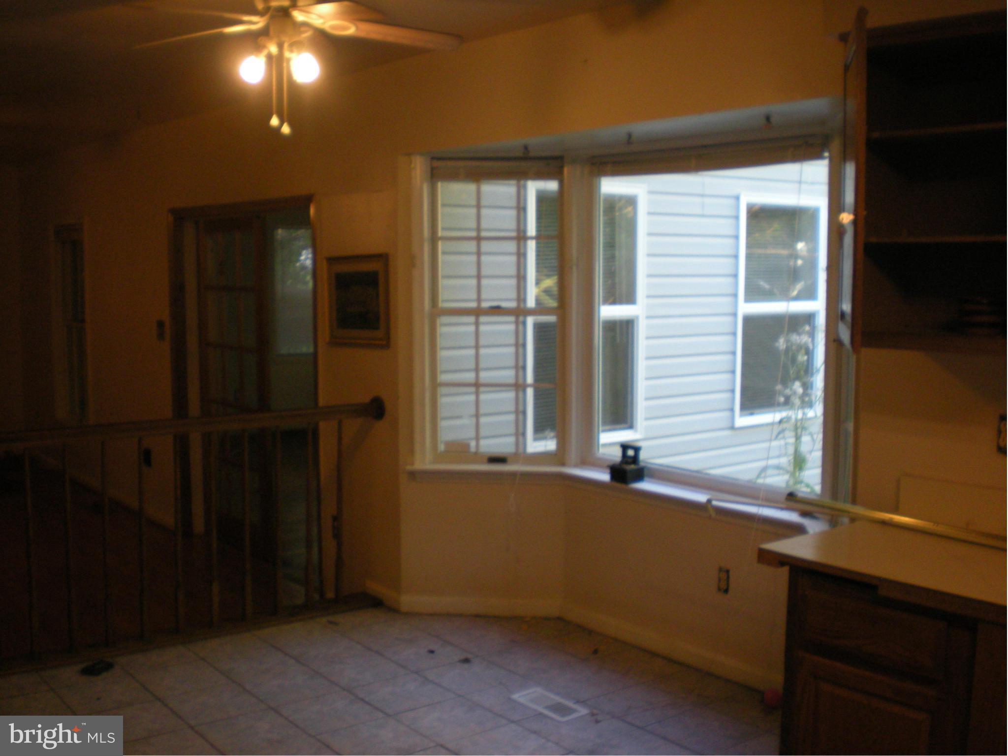 10812 Golf Course Terrace Bowie, MD 20721 - Photo 9 of 14 a view of an empty room with a window