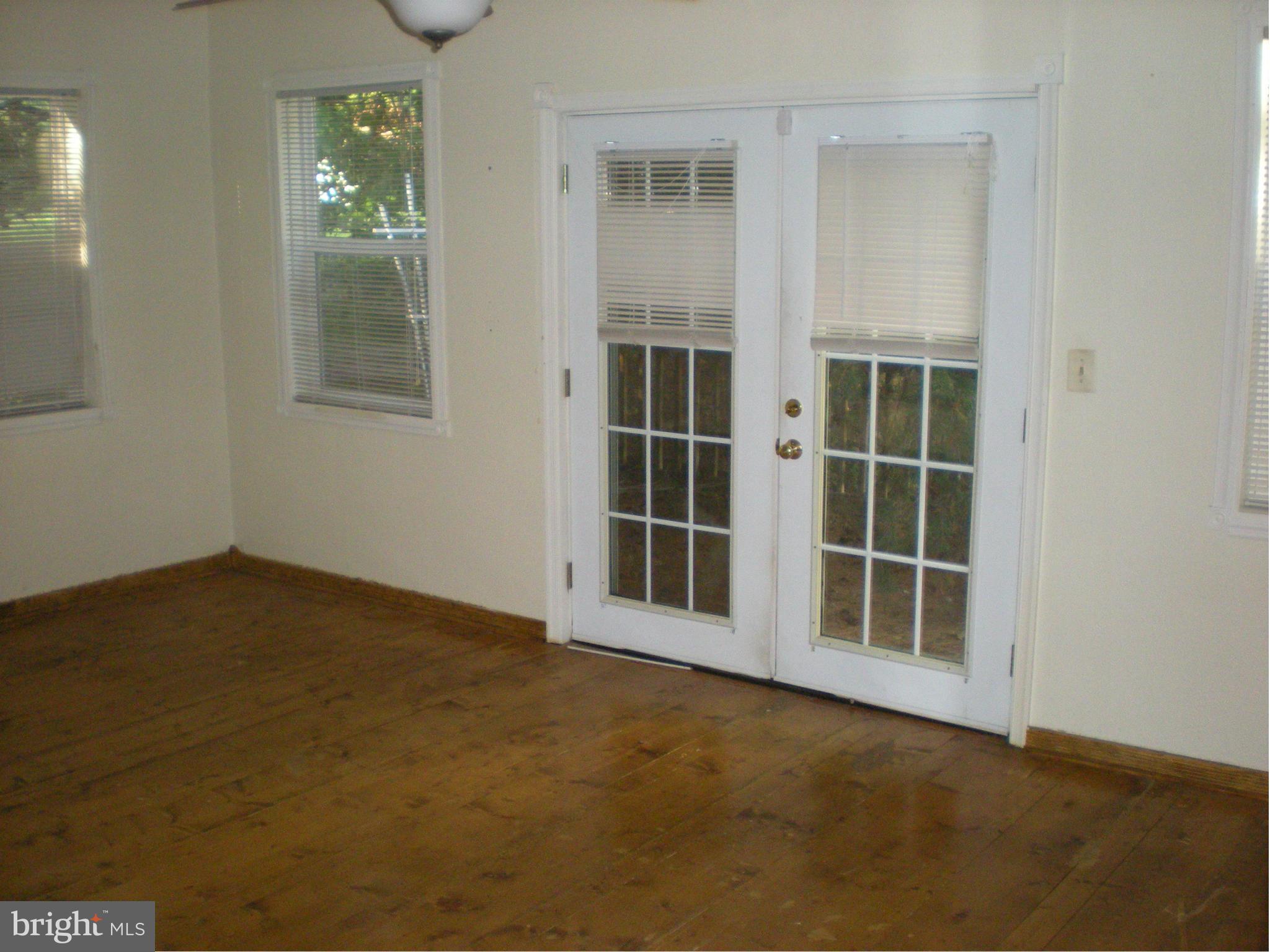 10812 Golf Course Terrace Bowie, MD 20721 - Photo 10 of 14 an empty room with windows