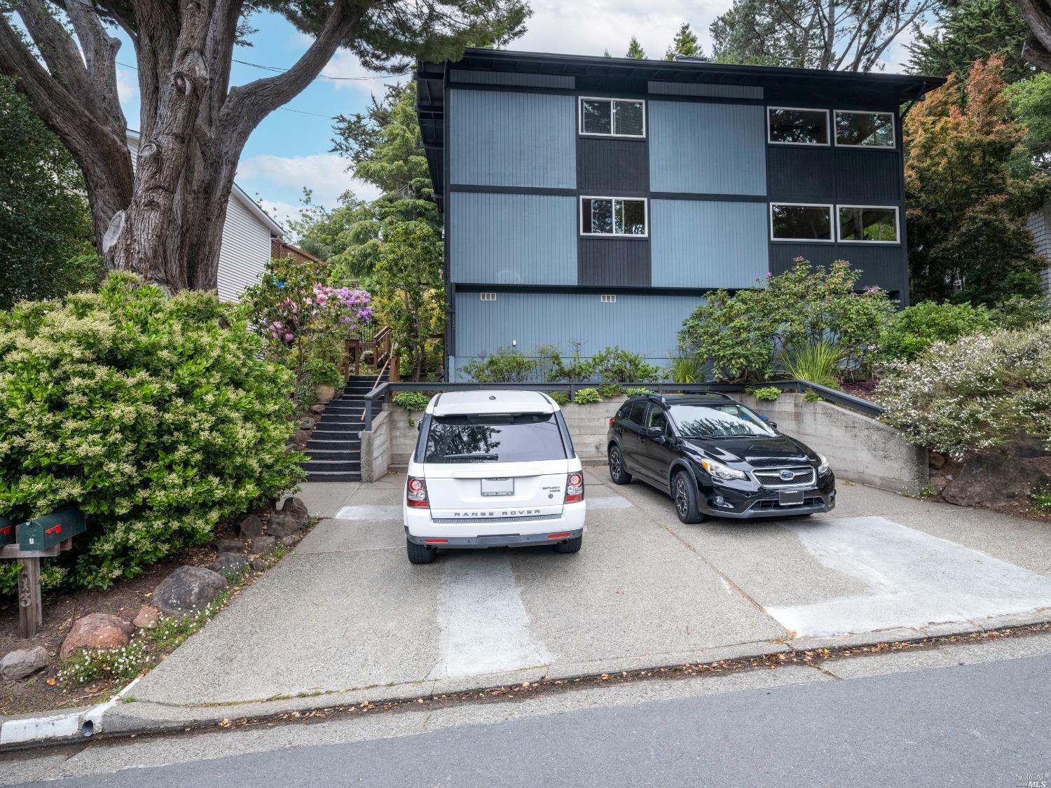 113 Belvedere Drive Mill Valley, CA 94941 - Photo 1 of 1 a car parked in front of a house