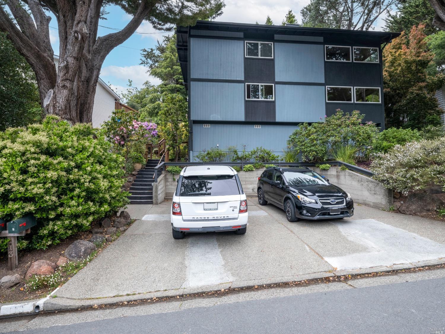 a car parked in front of a house