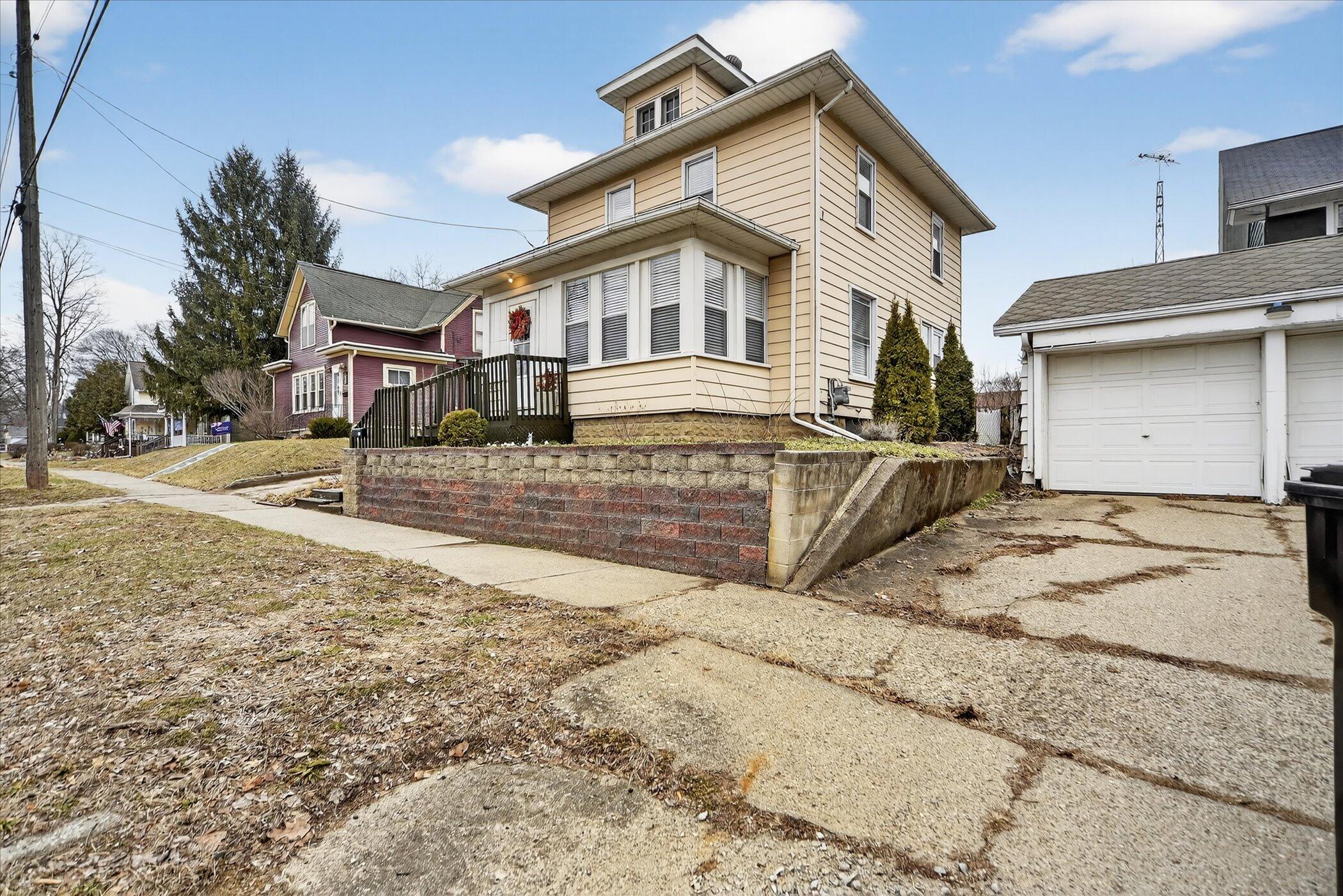 406 Garfield Street Jackson, MI 49203 - Photo 3 of 27 04-406-Garfield-St-Jackson-MI-49203-Wind