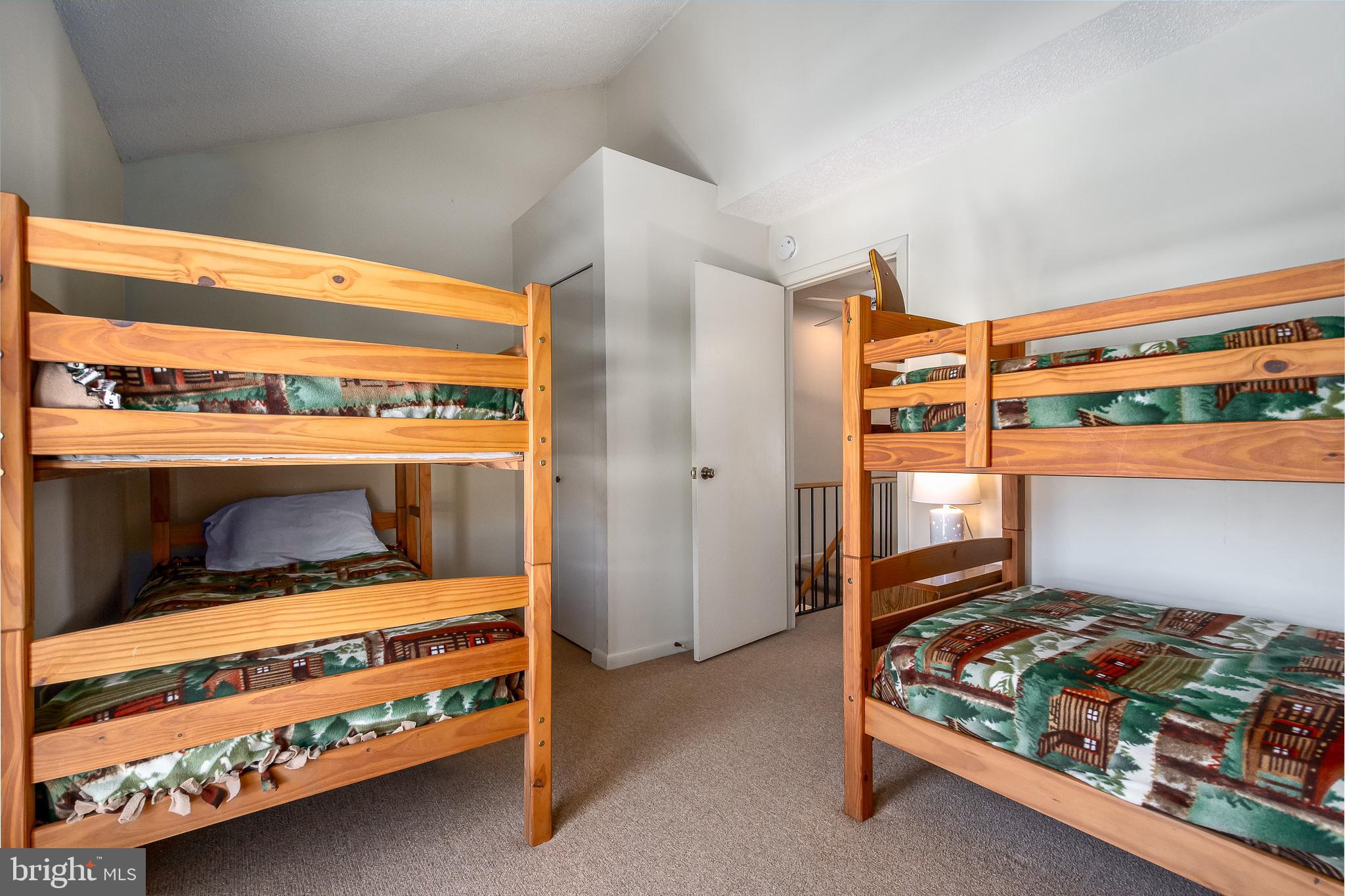 14 Winding Way, Unit 18B McHenry, MD 21541 - Photo 19 of 44 a living room with furniture and a dresser