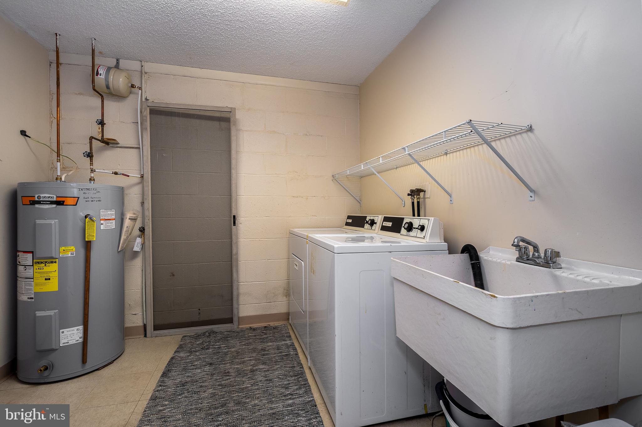 14 Winding Way, Unit 18B McHenry, MD 21541 - Photo 23 of 44 a room with storage and utility