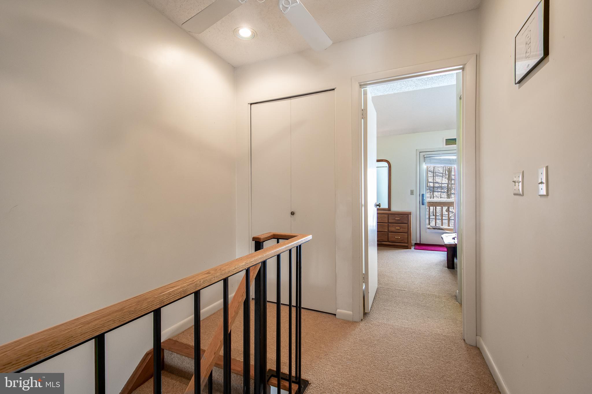 14 Winding Way, Unit 18B McHenry, MD 21541 - Photo 28 of 44 a view of hallway with wooden floor