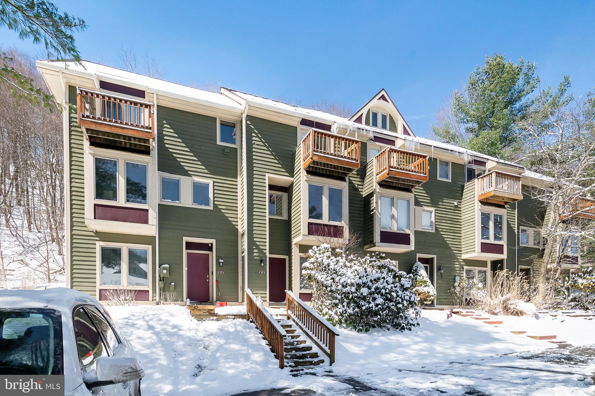 14 Winding Way, Unit 18B McHenry, MD 21541 - Photo 3 of 44 a front view of a house with street