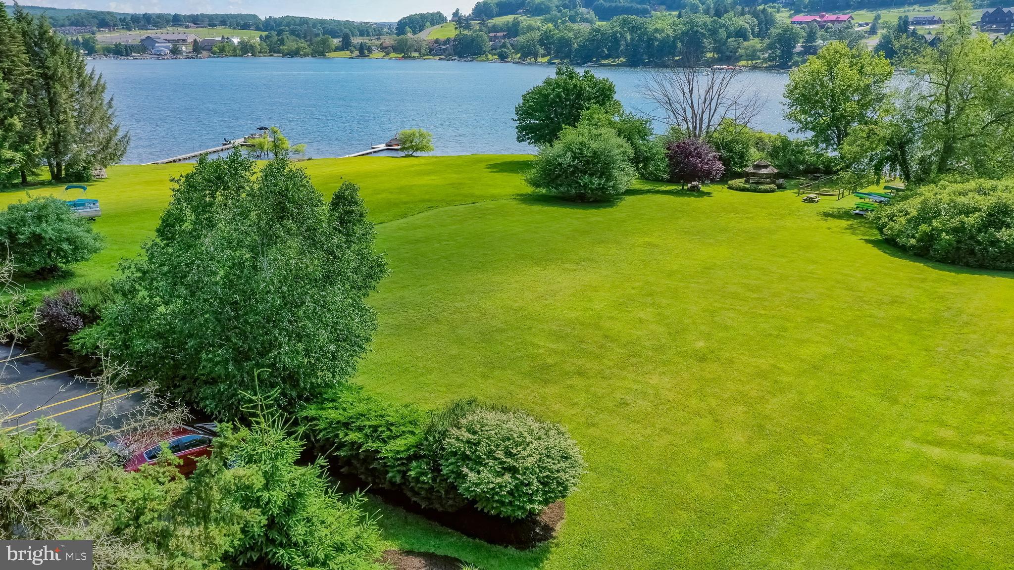 14 Winding Way, Unit 18B McHenry, MD 21541 - Photo 31 of 44 a view of a garden with a lake