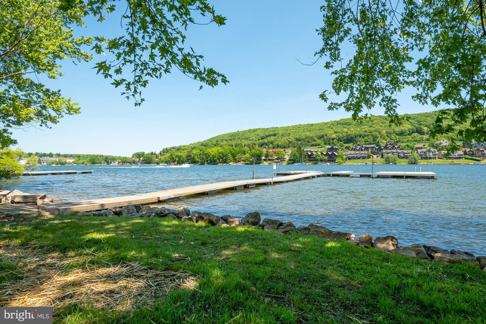 14 Winding Way, Unit 18B McHenry, MD 21541 - Photo 35 of 44 a view of a lake with a big yard
