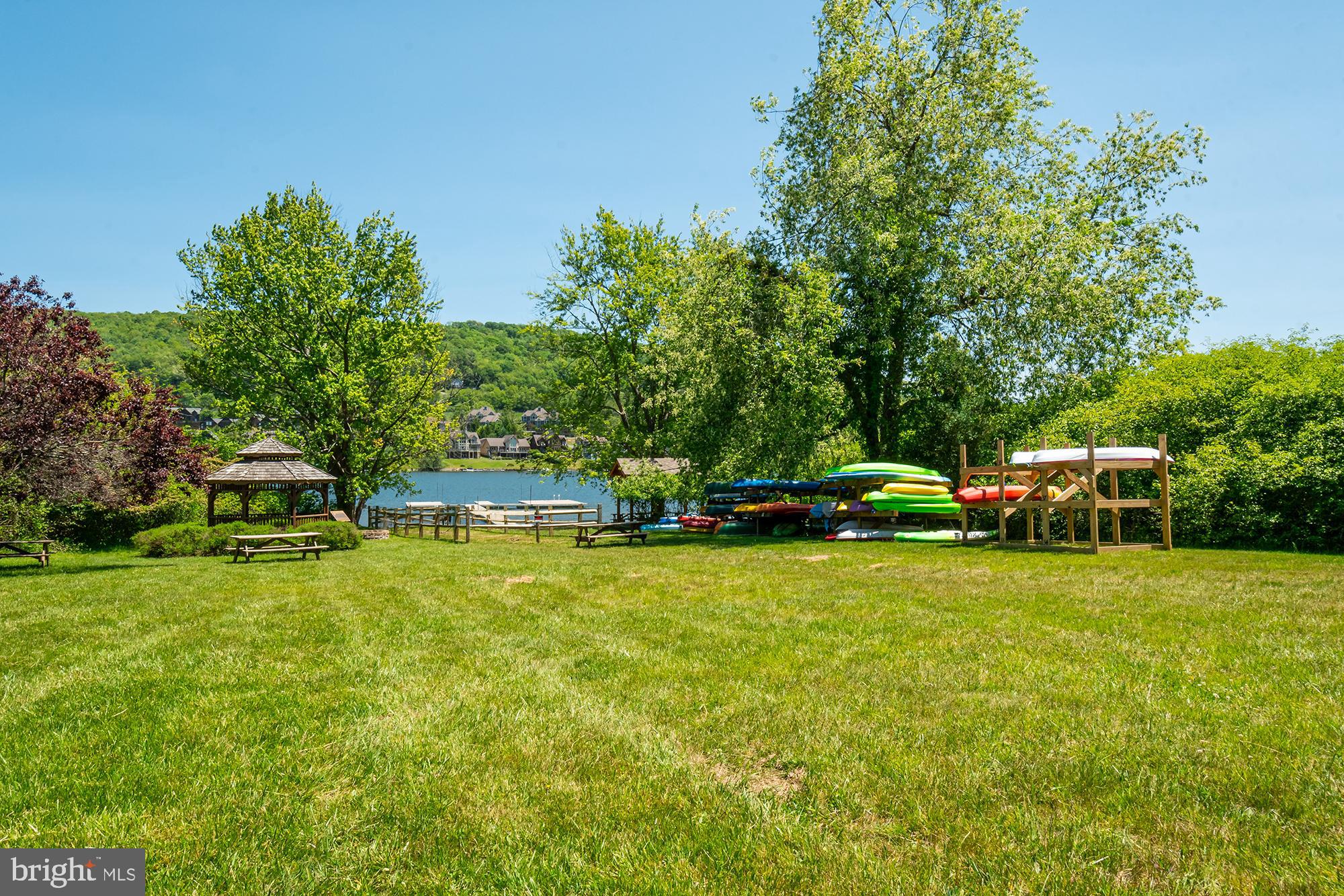 14 Winding Way, Unit 18B McHenry, MD 21541 - Photo 42 of 44 a house with swimming pool in front of it