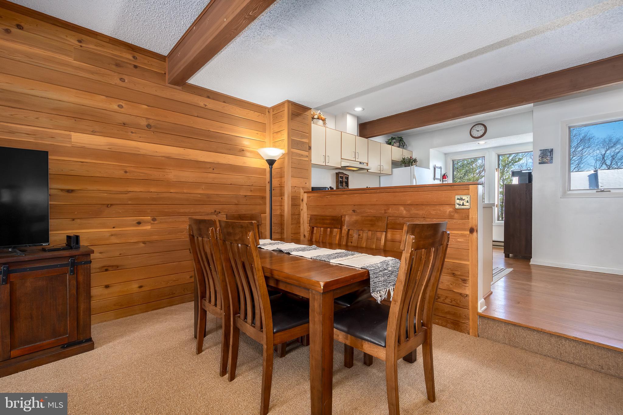 14 Winding Way, Unit 18B McHenry, MD 21541 - Photo 6 of 44 a dining room with furniture and wooden floor