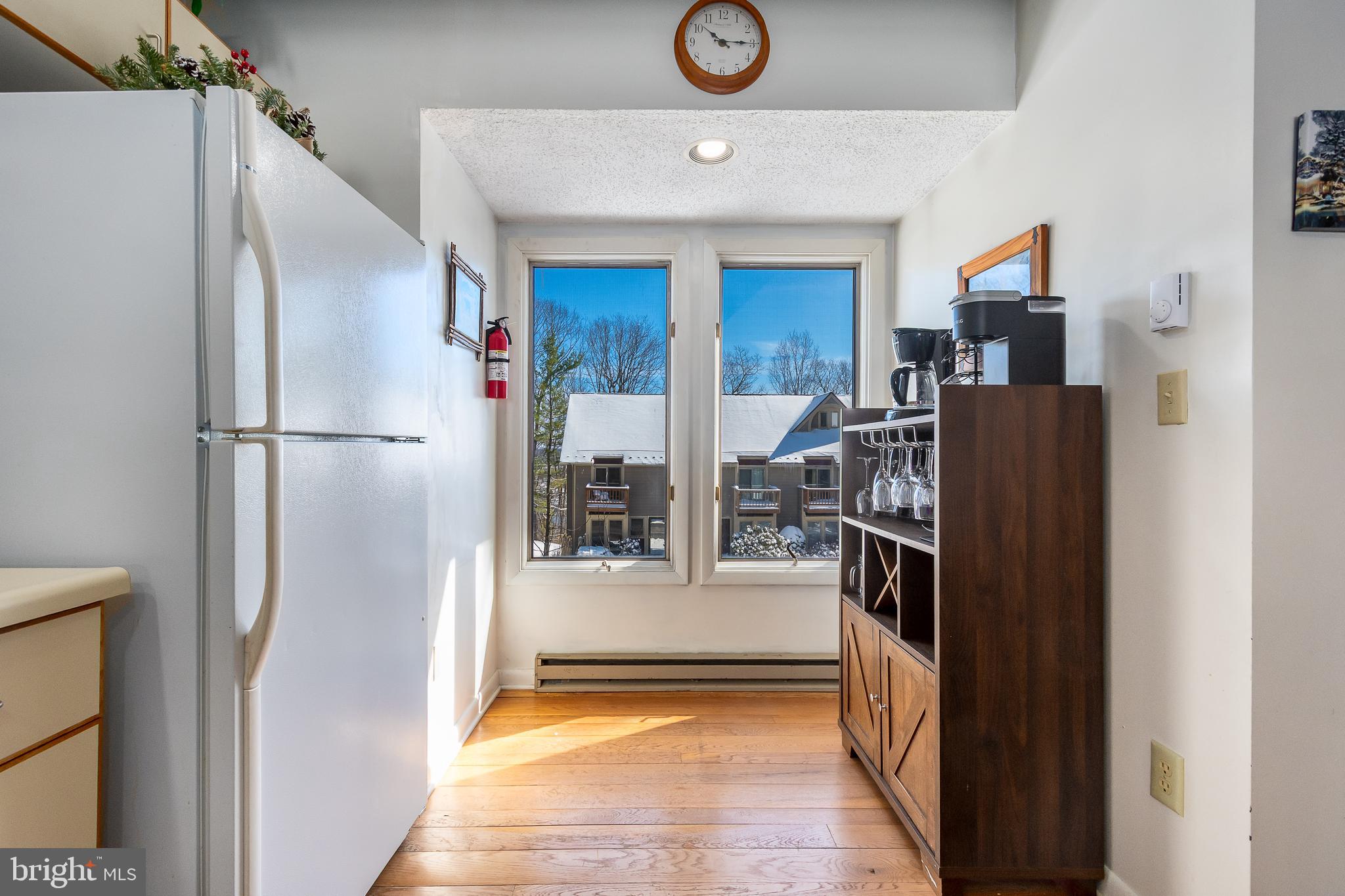 14 Winding Way, Unit 18B McHenry, MD 21541 - Photo 9 of 44 a view of kitchen with stainless steel appliances granite countertop refrigerator and washer