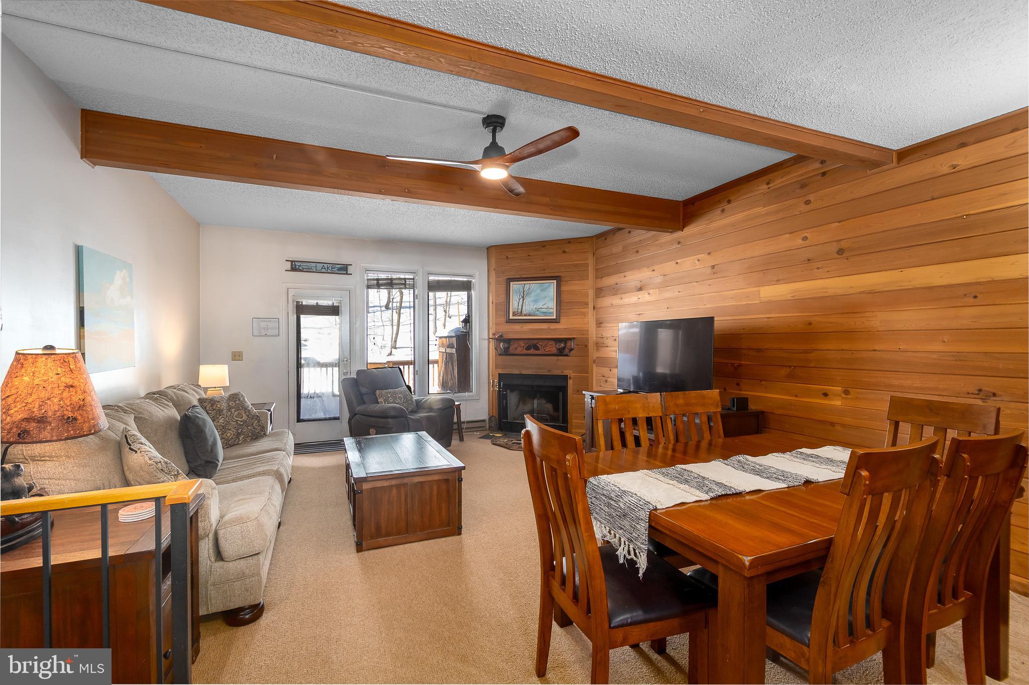 14 Winding Way, Unit 18B McHenry, MD 21541 - Photo 10 of 44 a dining room with furniture and wooden floor