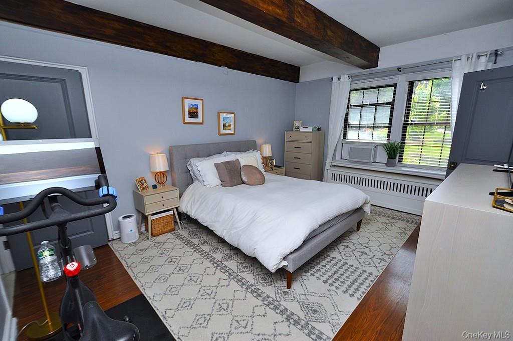 192 Garth Road, Unit TP Scarsdale, NY 10583 - Photo 4 of 43 The private bedroom wing features two spacious bedrooms and two beautifully updated bathrooms, creating a peaceful retreat from the day. Every detail has been carefully curated to deliver comfort, style, and functionality.