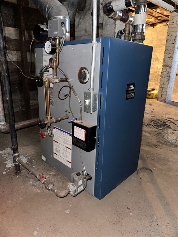9 Prince Street Springfield, MA 01109 - Photo 17 of 18 a view of water heater room