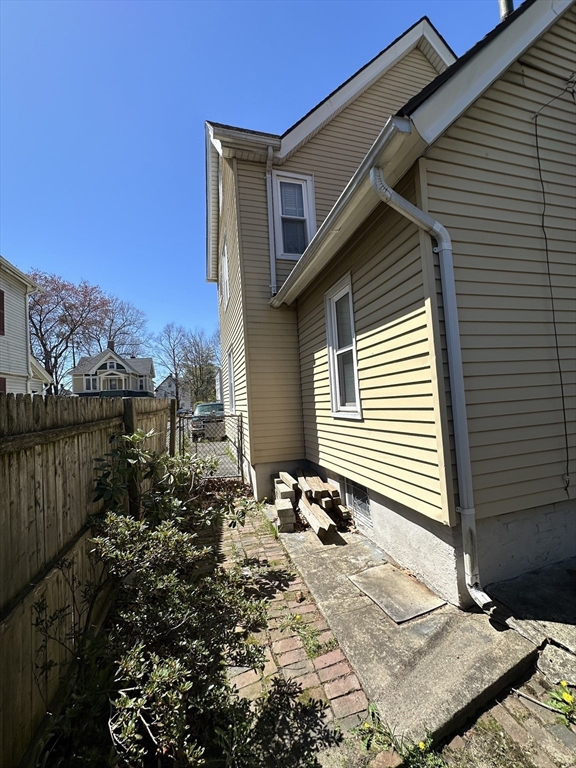 9 Prince Street Springfield, MA 01109 - Photo 5 of 18 a front view of a house with a yard