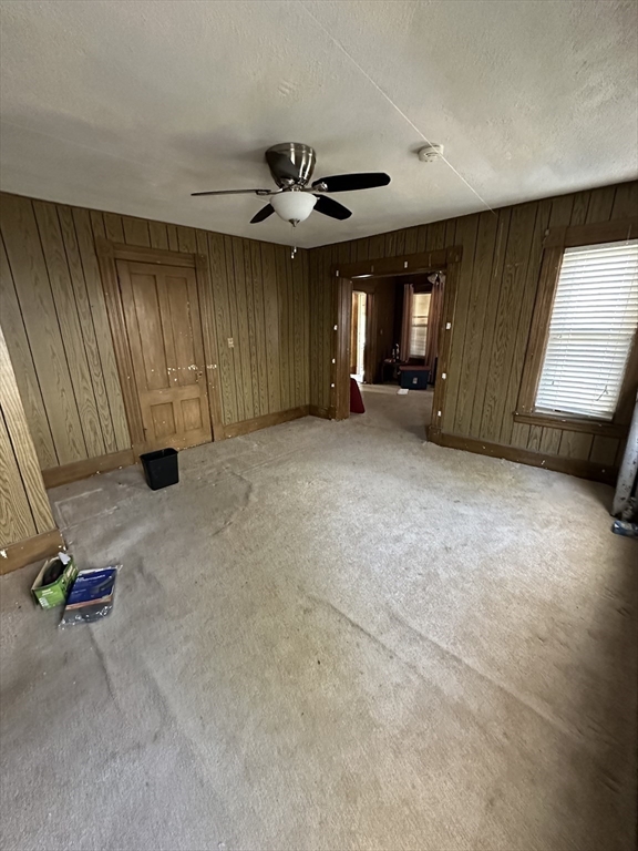 9 Prince Street Springfield, MA 01109 - Photo 8 of 18 an empty room with windows and fan