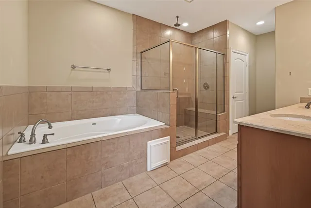 a bathroom with a shower and toilet