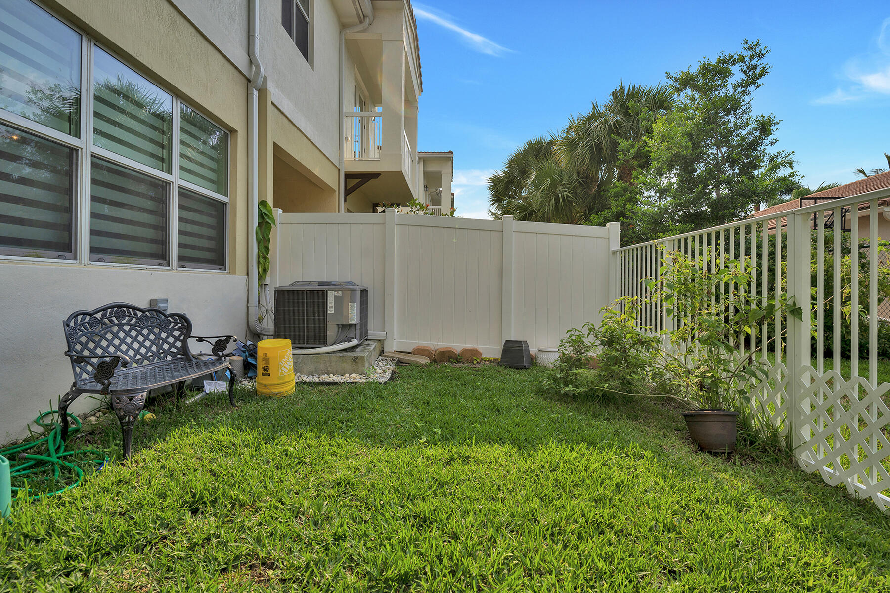 100 Northwest 69th Circle, Unit 22 Boca Raton, FL 33487 - Photo 26 of 29 Fenced Backyard