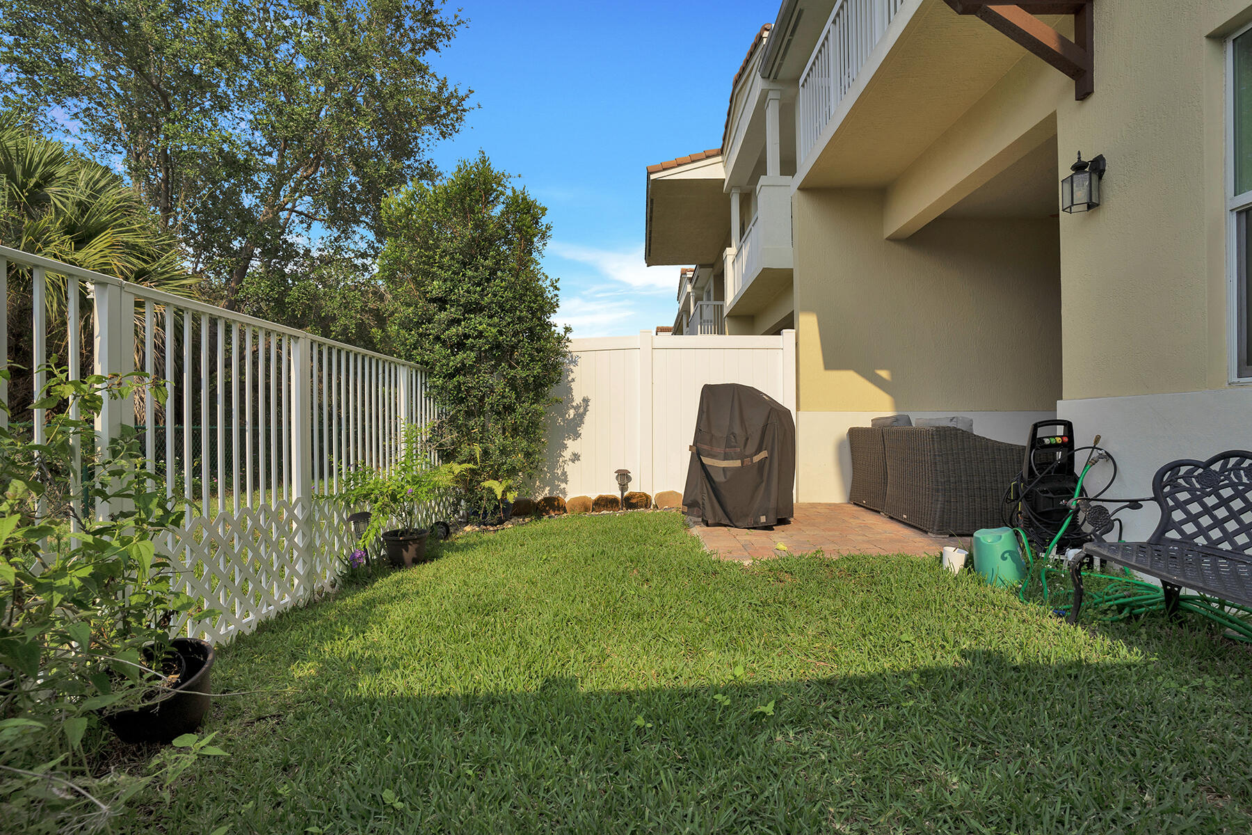100 Northwest 69th Circle, Unit 22 Boca Raton, FL 33487 - Photo 27 of 29 Fenced Backyard