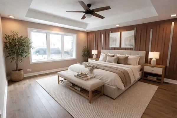 a bedroom with a bed couch and window