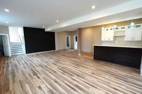 a view of kitchen with wooden floor