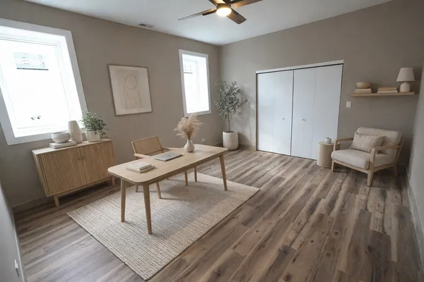 a living room with a couch and a table