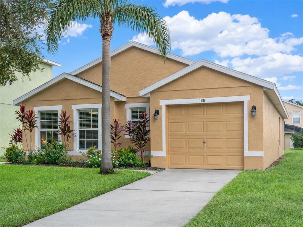 front view of a house and a yard