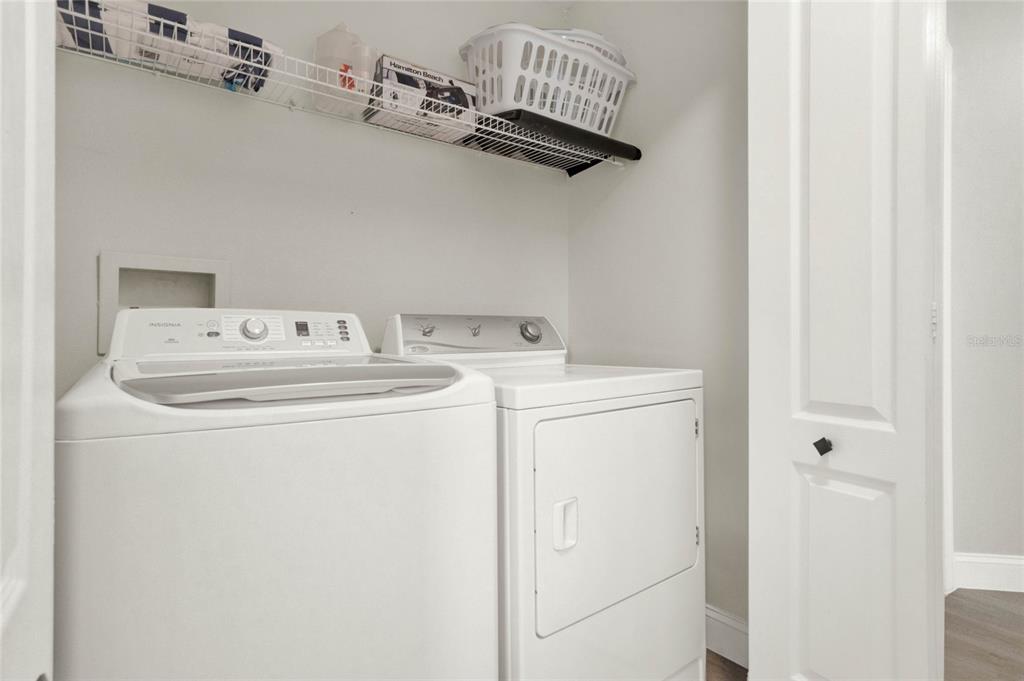 188 Ridgemont Court Davenport, FL 33896 - Photo 26 of 38 a utility room with dryer and washer
