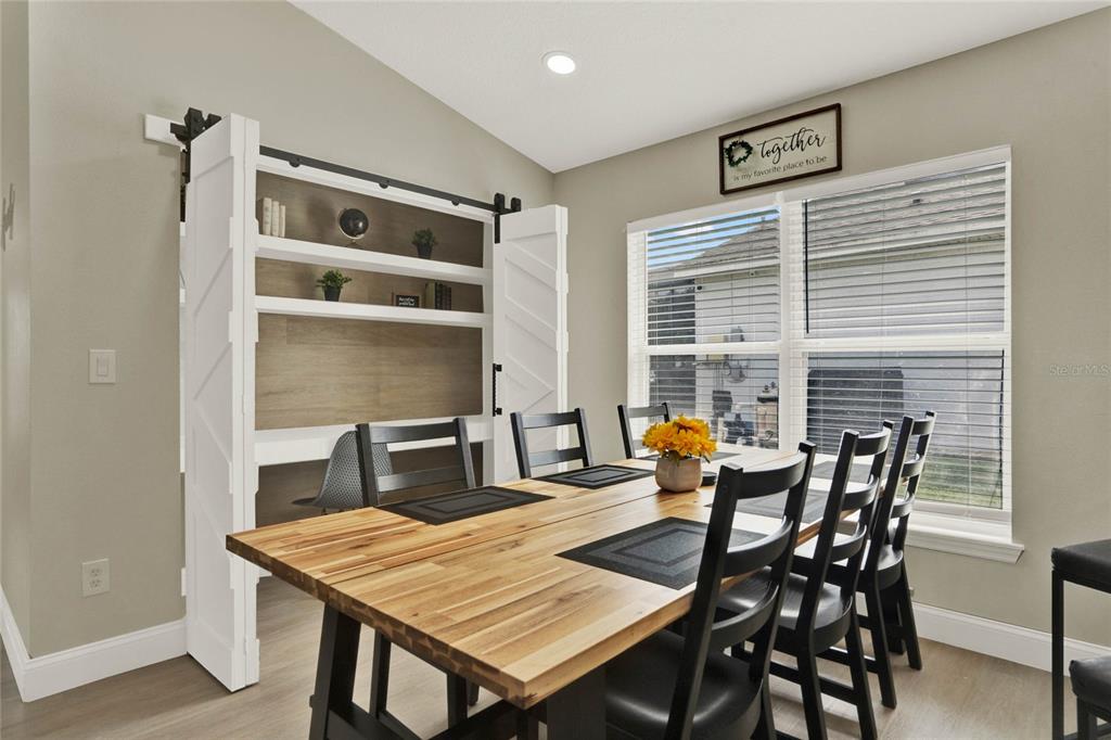 188 Ridgemont Court Davenport, FL 33896 - Photo 7 of 38 a dining room with furniture and window