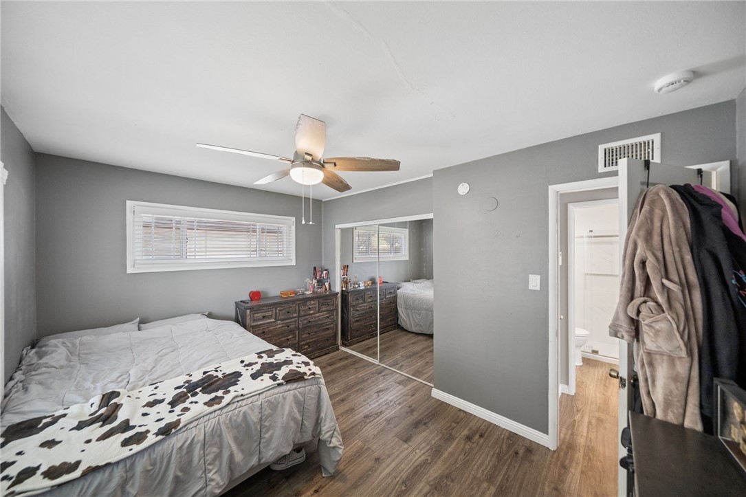 4869 Serrano Place Riverside, CA 92504 - Photo 18 of 40 Additional bedroom view showcasing mirrored closet doors, ample storage, and an open layout that enhances the room’s spacious feel.