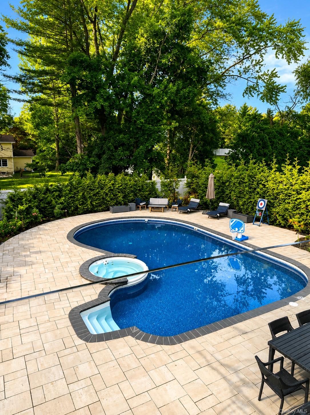 4 Cortland Road Monsey, NY 10952 - Photo 28 of 29 a view of a swimming pool with chairs