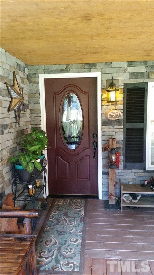 2115 Government Road Clayton, NC 27520 - Photo 3 of 21 Appealing front entry with rock finish.