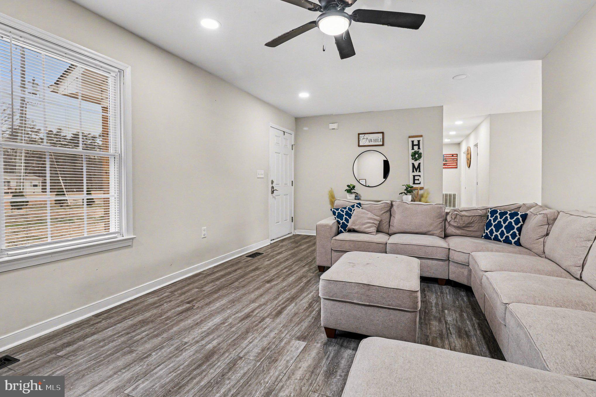 2225 Partlow Road Beaverdam, VA 23015 - Photo 12 of 27 a living room with furniture and a large window