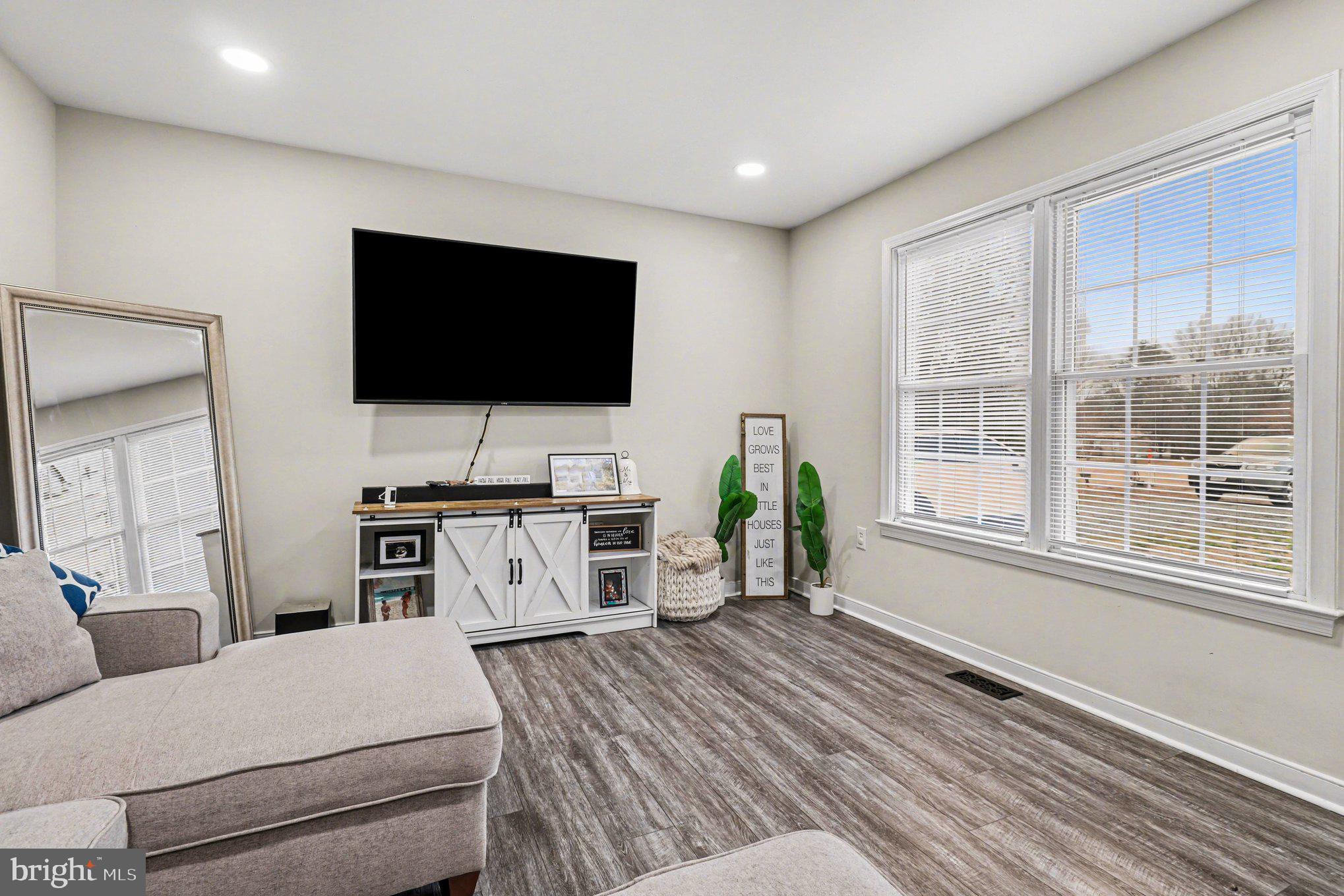 2225 Partlow Road Beaverdam, VA 23015 - Photo 13 of 27 a living room with furniture and a flat screen tv