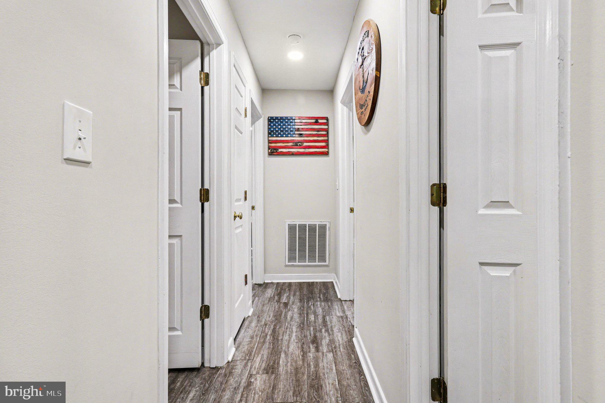 2225 Partlow Road Beaverdam, VA 23015 - Photo 14 of 27 a view of a hallway with wooden floor and entryway