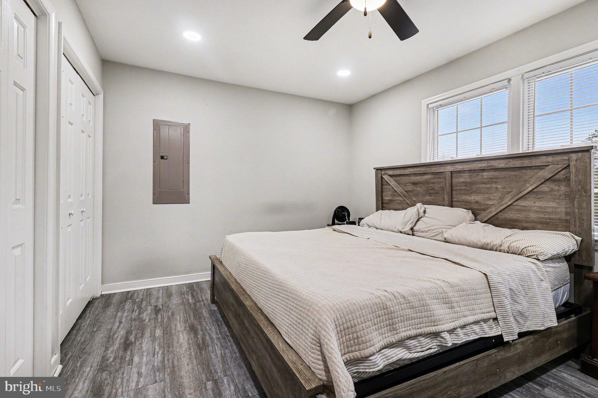 2225 Partlow Road Beaverdam, VA 23015 - Photo 17 of 27 a bedroom with a bed and a ceiling fan