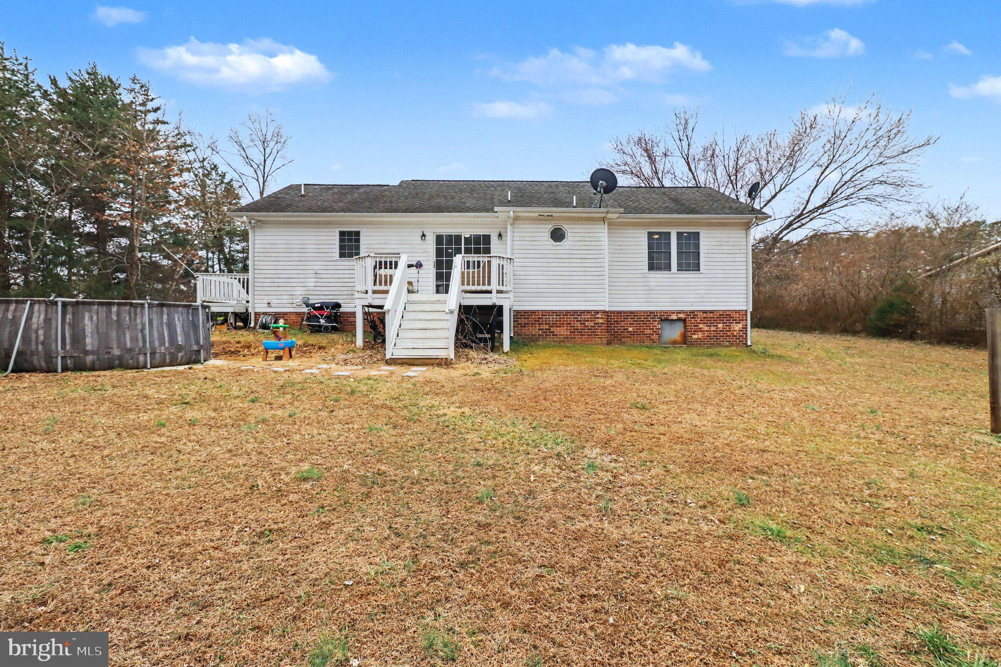 2225 Partlow Road Beaverdam, VA 23015 - Photo 3 of 27 a view of a house with swimming pool and sitting area