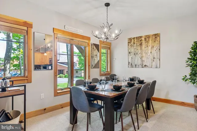 a view of living room with furniture and flat screen tv