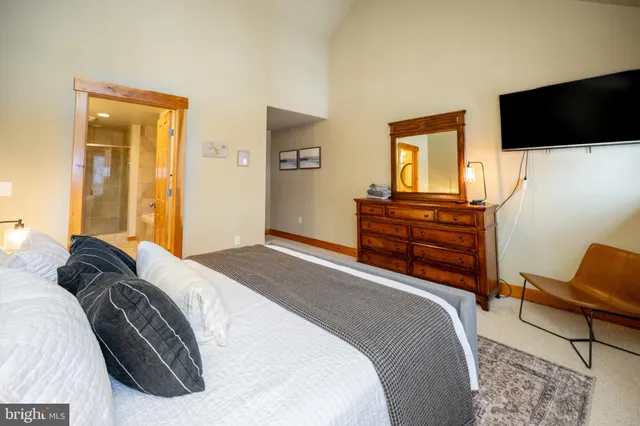 a view of a swimming pool with an outdoor seating and yard