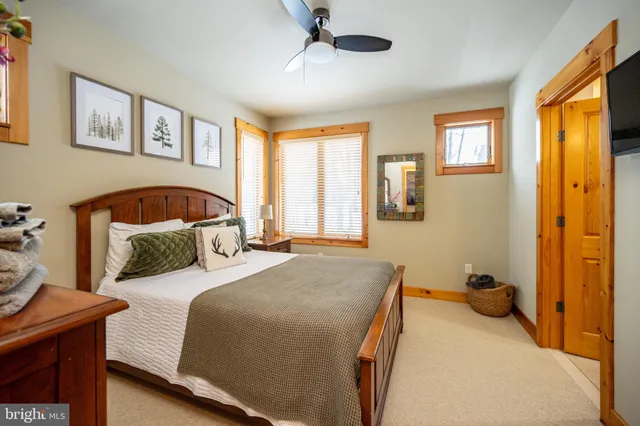 a outdoor living space with patio furniture and wooden floor