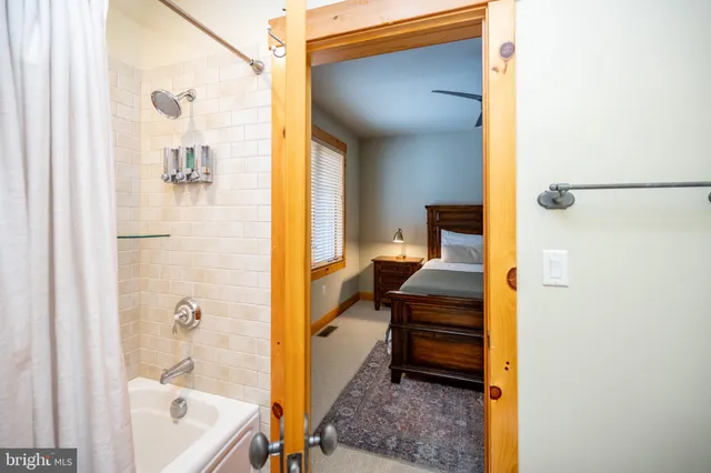 a view of house with a yard