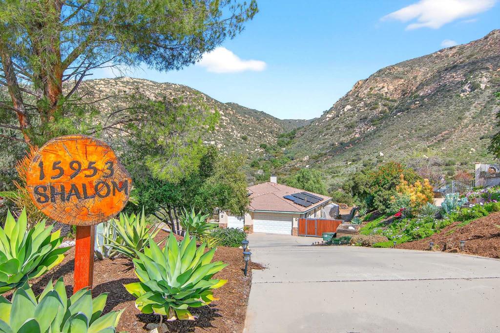 15953 Shalom Road Ramona, CA 92065 - Photo 2 of 71 a picture of a tree with a yard