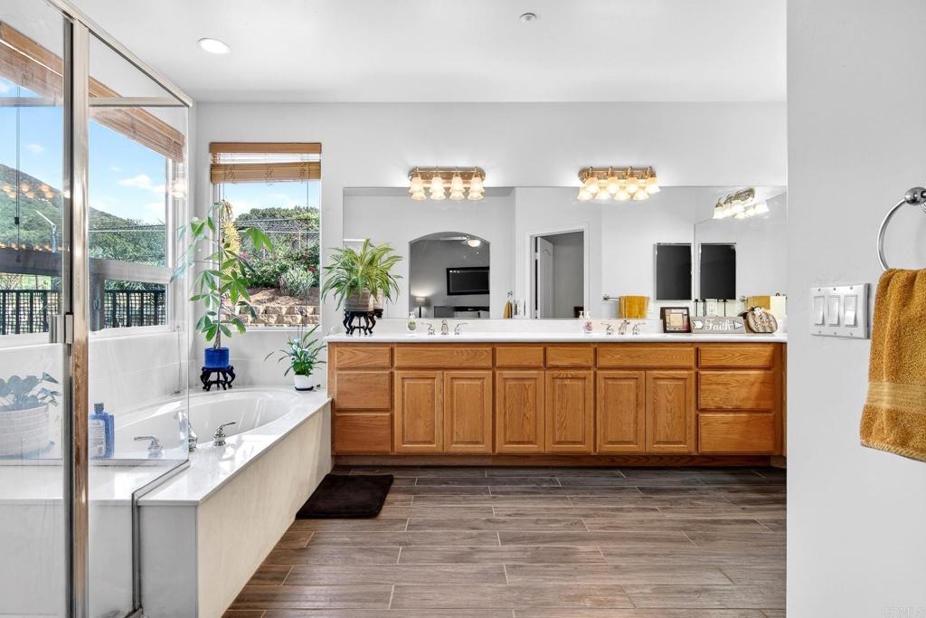15953 Shalom Road Ramona, CA 92065 - Photo 25 of 71 a large white kitchen with a large window