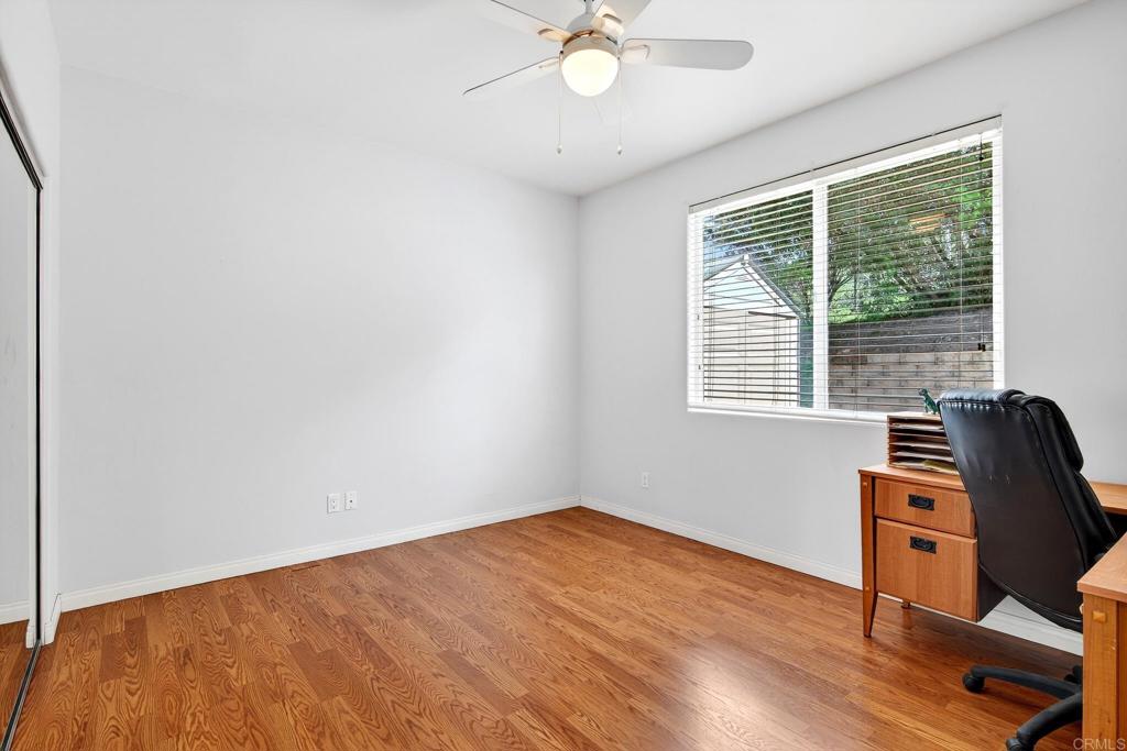 15953 Shalom Road Ramona, CA 92065 - Photo 32 of 71 a view of workspace with wooden floor and windows