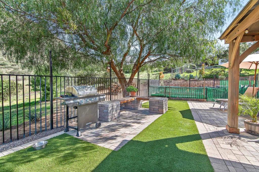 15953 Shalom Road Ramona, CA 92065 - Photo 44 of 71 a view of a backyard with sitting area