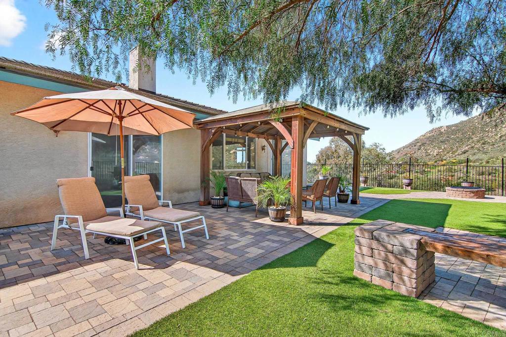 15953 Shalom Road Ramona, CA 92065 - Photo 47 of 71 a view of a chair and table in the garden