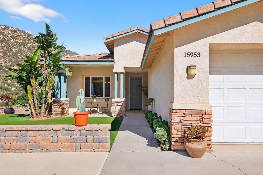 15953 Shalom Road Ramona, CA 92065 - Photo 5 of 71 a front view of a house with patio